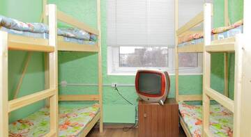 Фото номера Спальное место на двухъярусной кровати в общем номере для женщин Хостел Хостел «Скандинавия-Галс» г. Выборг 3